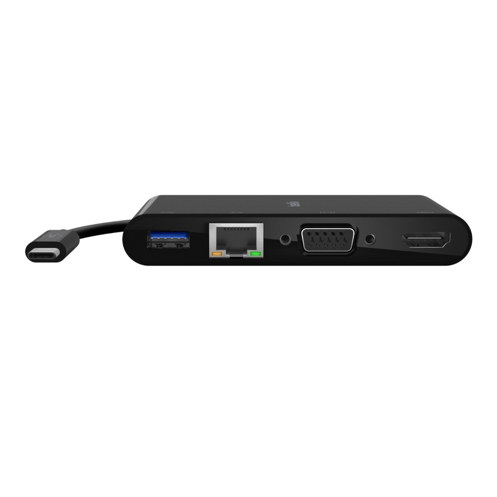 Hub USB-C negro con múltiples puertos como USB, Ethernet, VGA y HDMI sobre fondo blanco.