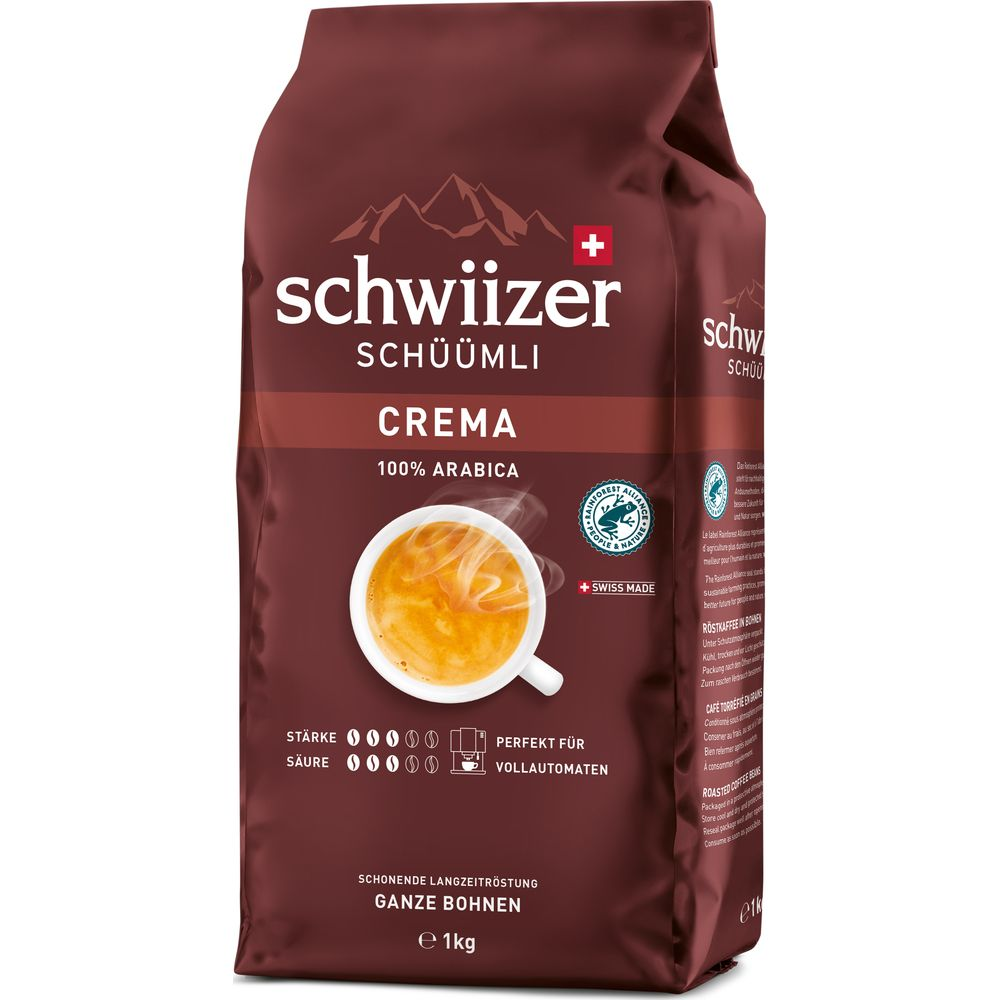 Un sacchetto marrone di caffè in grani Schwiizer Schüümli Crema con grafica di una tazza di caffè.