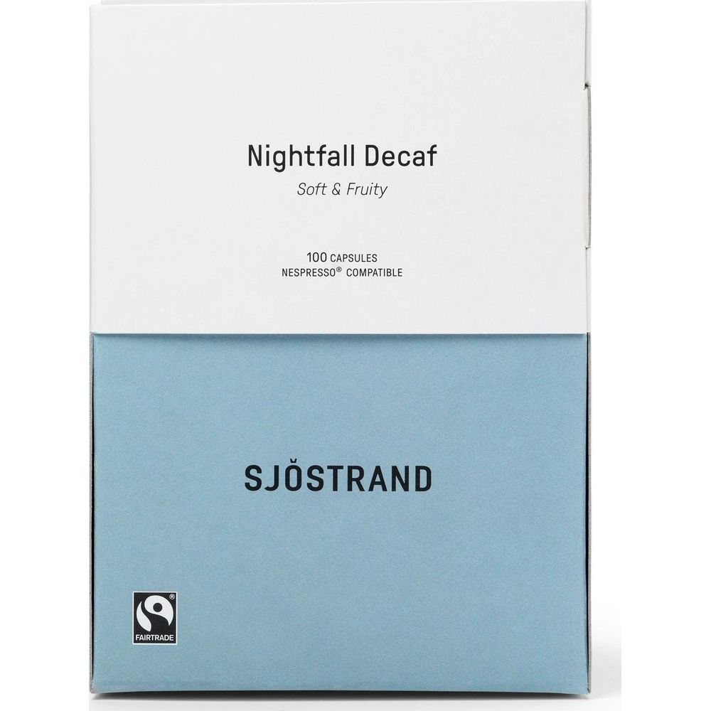 Scatola di capsule di caffè bianca e azzurro con etichetta Nightfall Decap e Sjostrand.