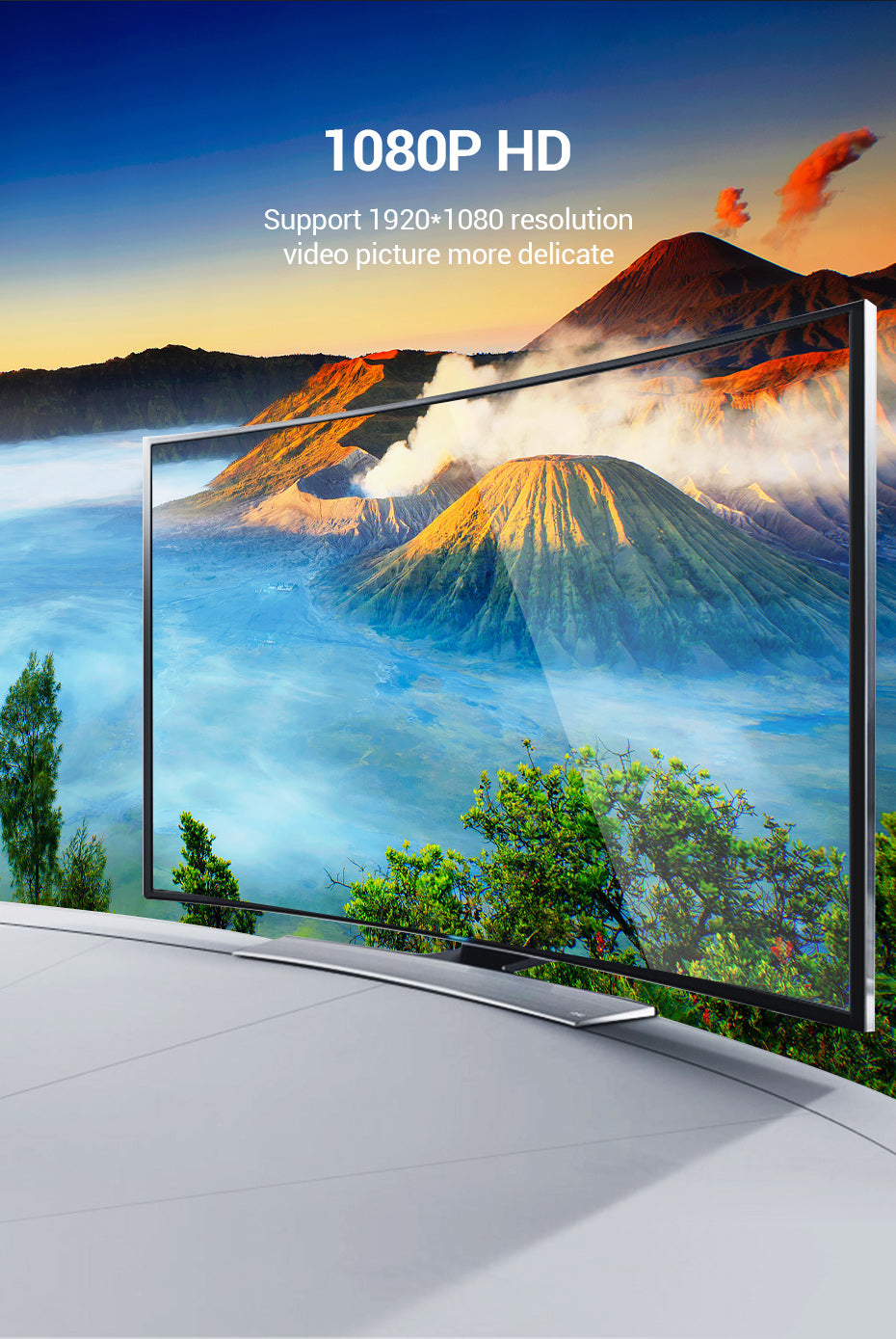Un televisor muestra un paisaje volcánico al atardecer con texto de 1080P HD arriba.
