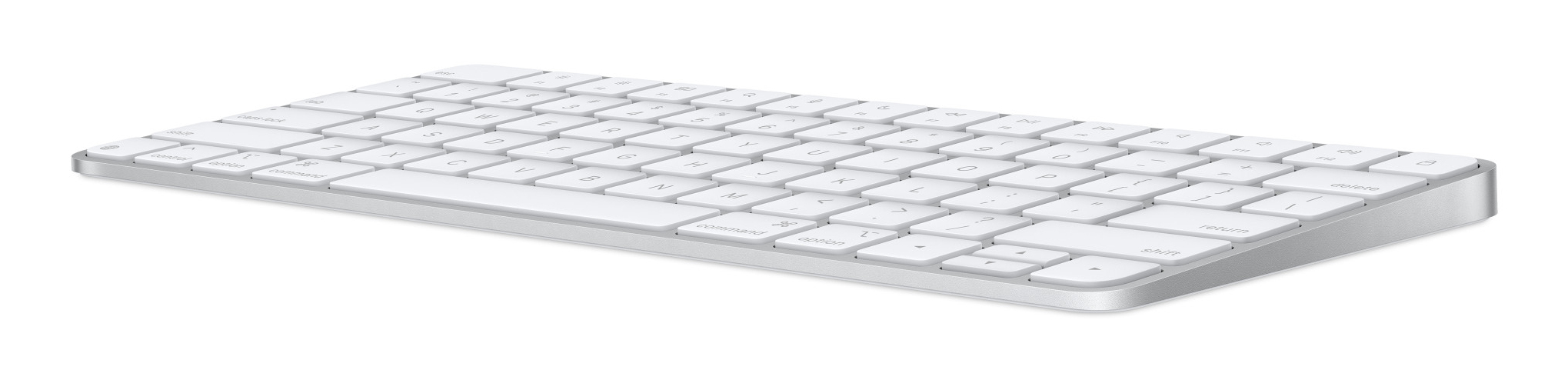 Una tastiera wireless bianca con tasti piatti è posizionata orizzontalmente su sfondo bianco.
