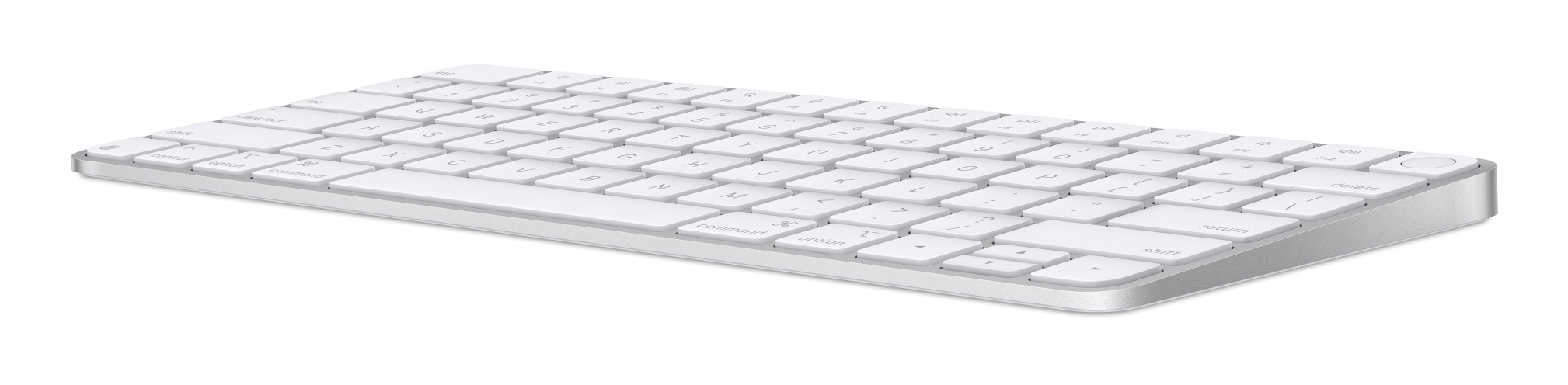 Una vista dal basso di un'elegante tastiera wireless bianca su sfondo bianco.