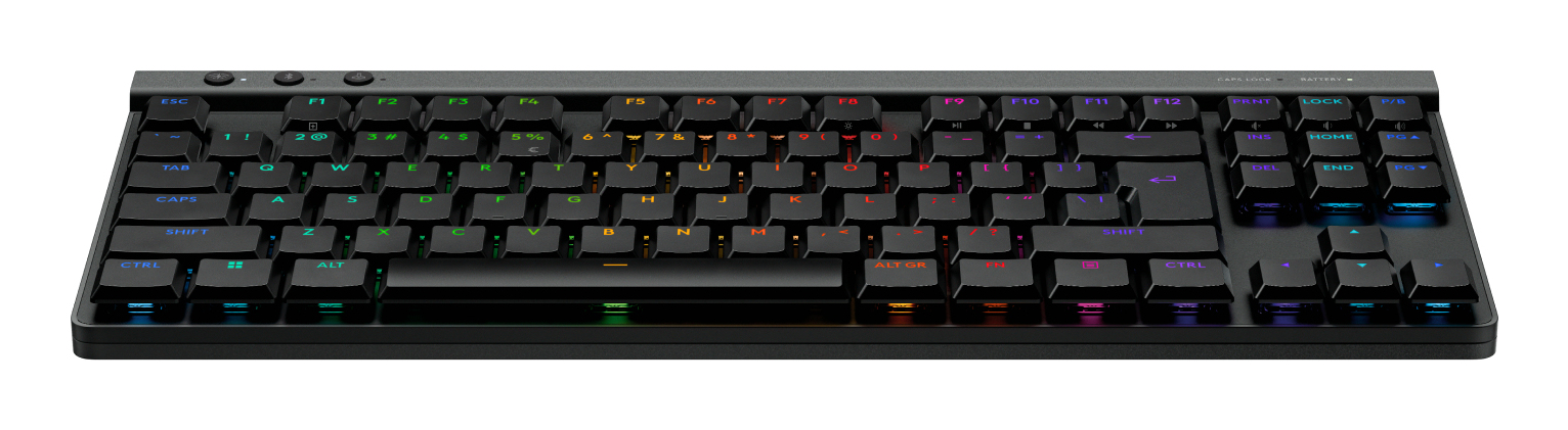 Teclado mecánico negro con retroiluminación RGB colorida sobre fondo blanco.