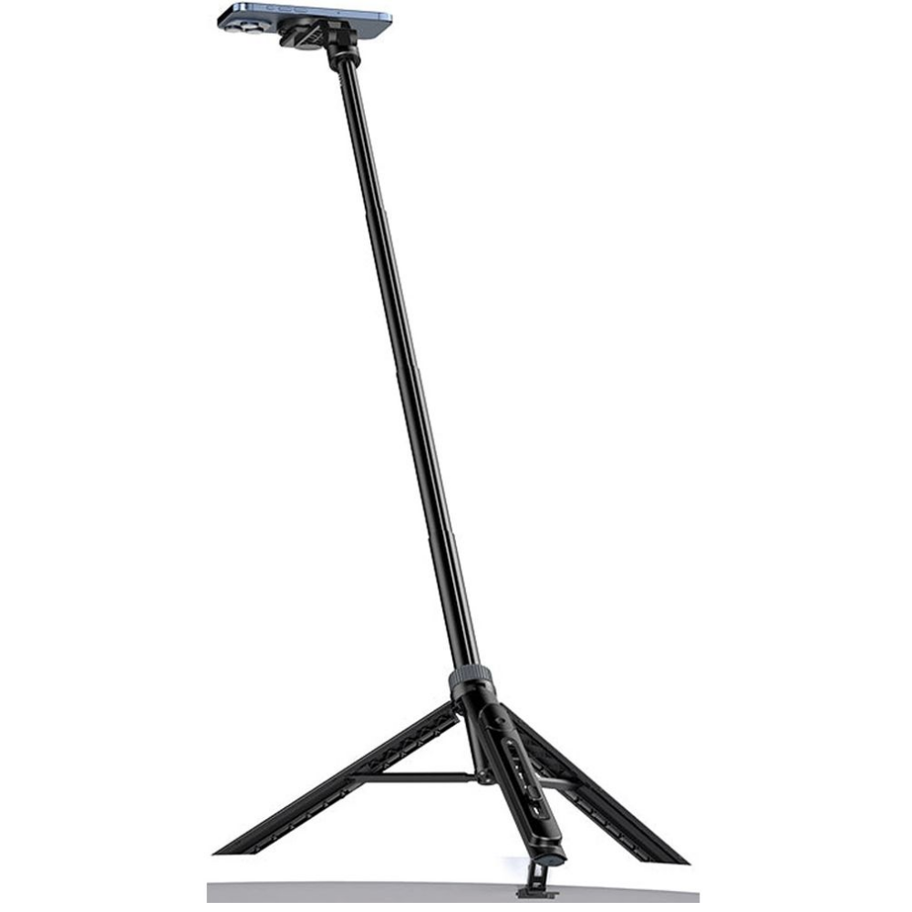 Ein schwarzes Selfie-Stick-Stativ steht auf einer grauen Oberfläche mit einem montierten Smartphone.