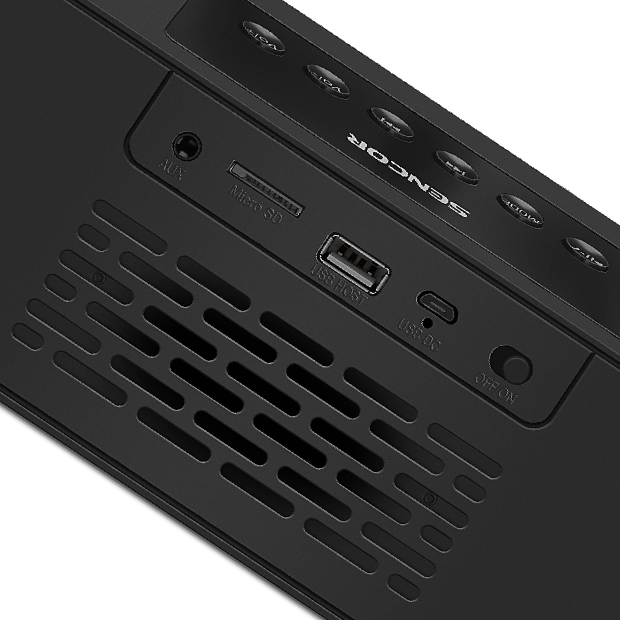 Schwarzes Audio-Gerät mit Aux-Anschluss, Micro-SD-Slot, USB-Host, USB-DC und Ein/Aus-Schalter.