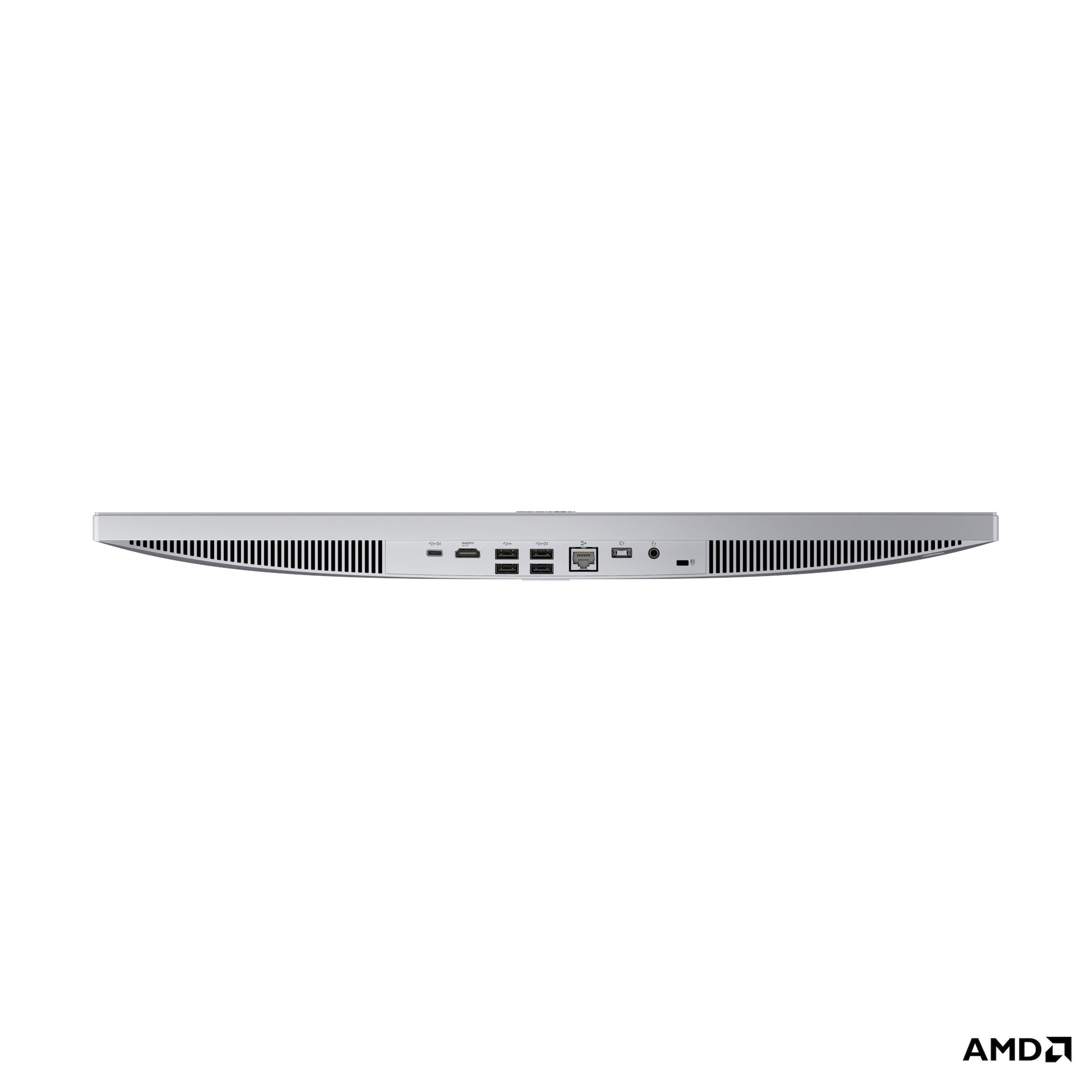 Vista posteriore di un PC all-in-one argento che mostra varie porte e griglie di ventilazione su sfondo bianco.