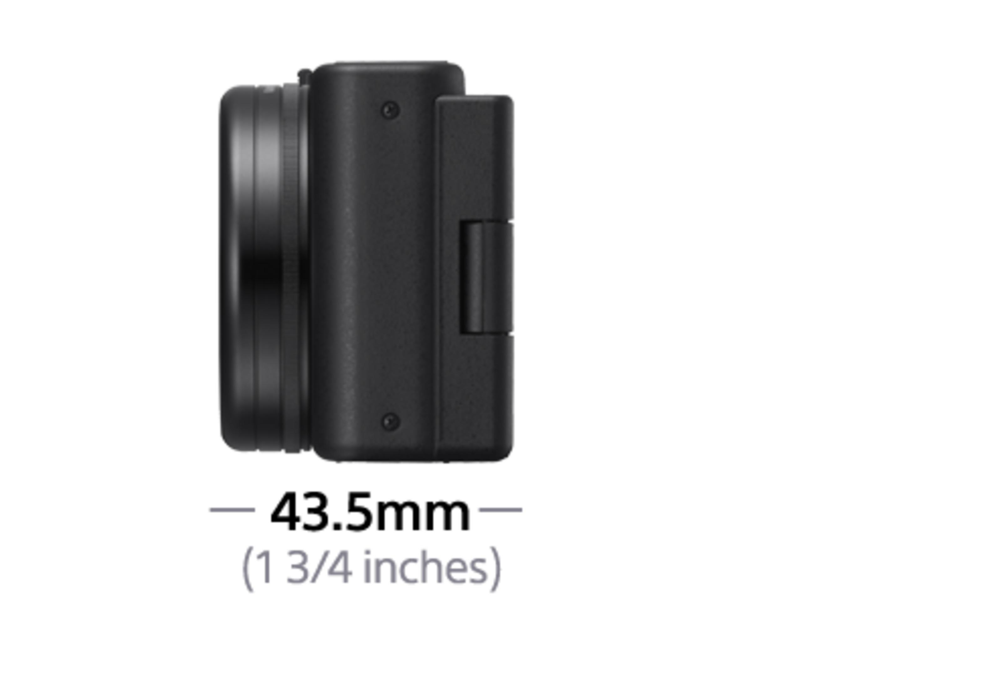 Vista laterale di una fotocamera compatta nera con una profondità di 43.5 mm.