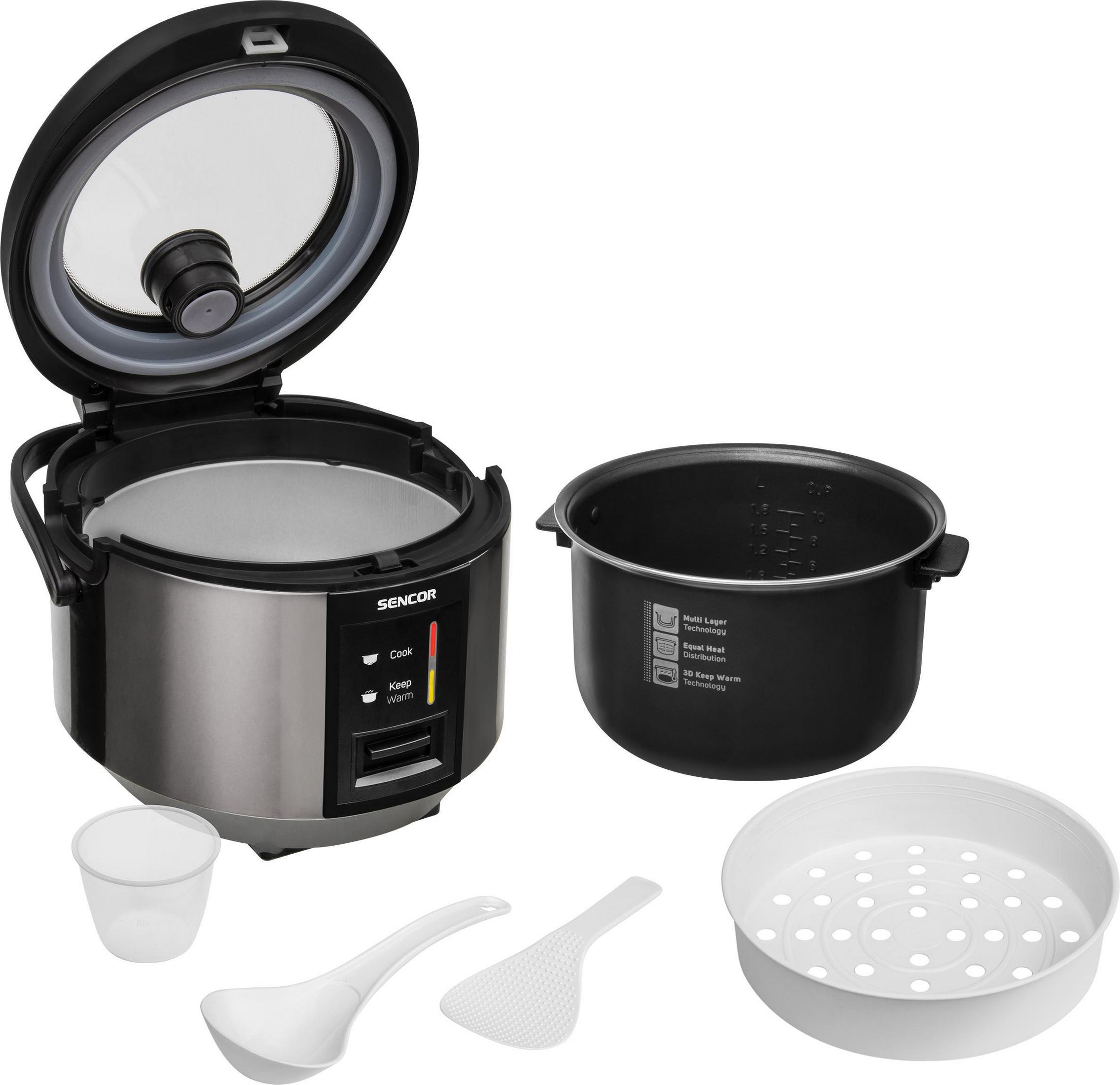 Silberner Sencor Reiskocher mit offenem Deckel, herausnehmbarem Innentopf, Dampfkorb, Messbecher und zwei Löffeln.