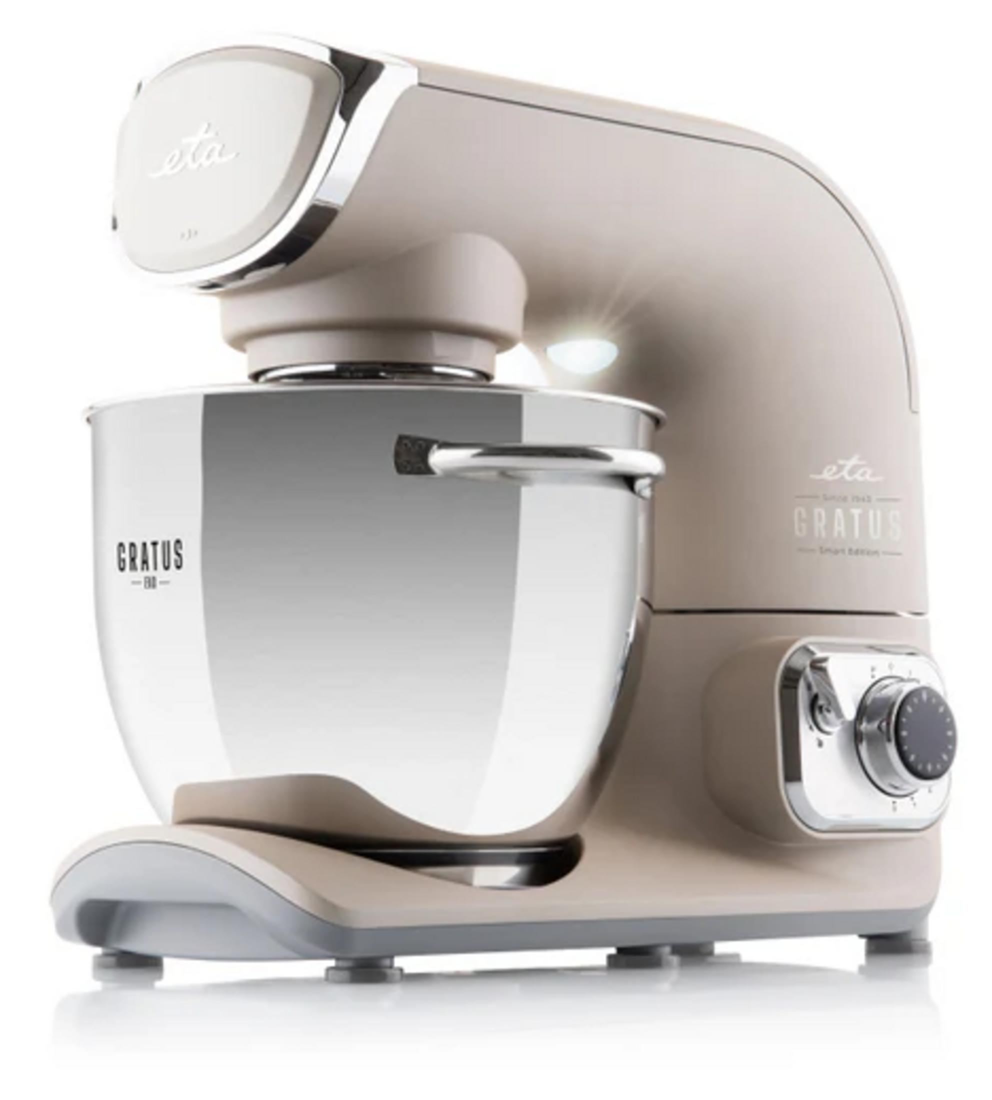 Ein beige farbener Küchenmixer mit Edelstahlschüssel und Drehregler auf weißem Hintergrund.