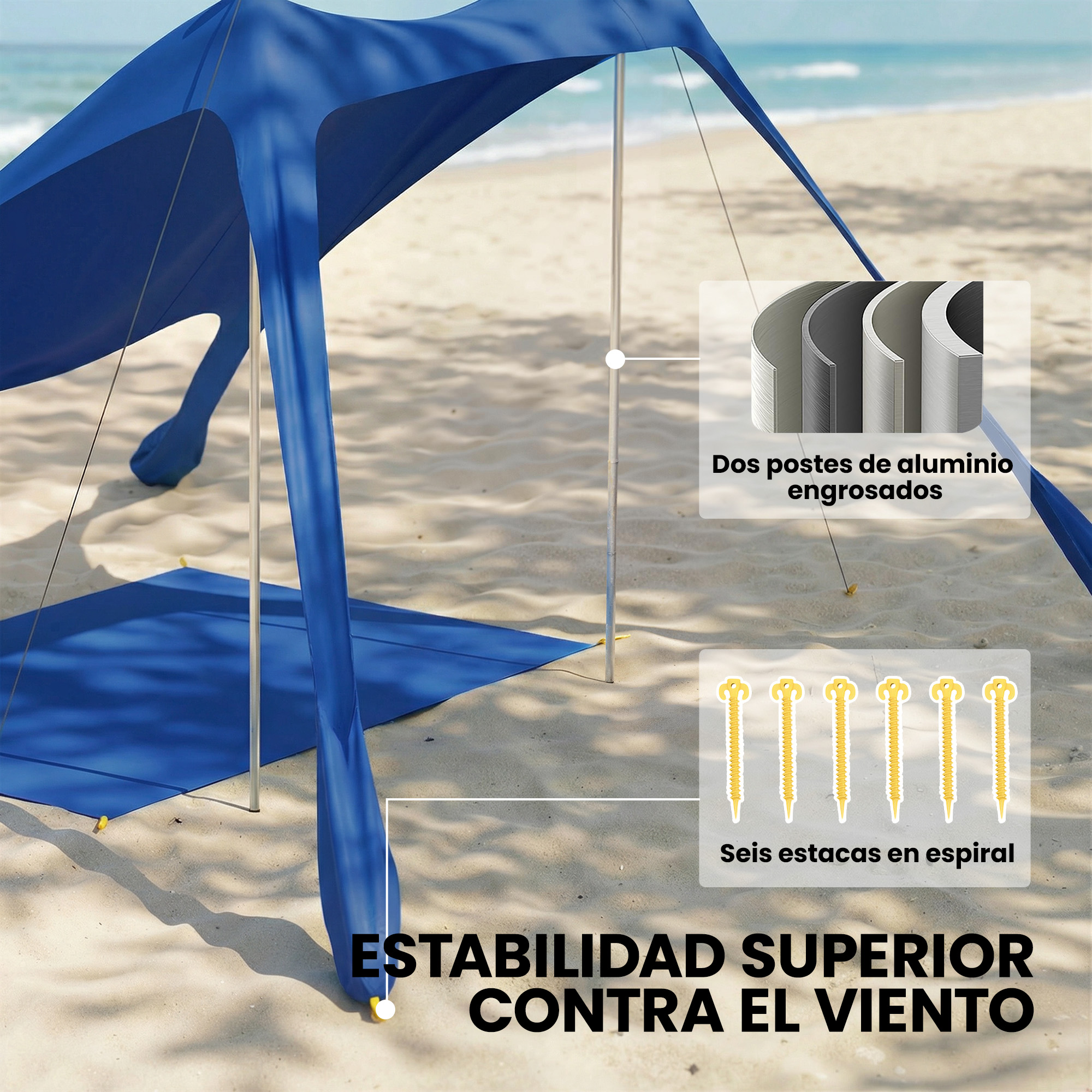 Tenda da spiaggia blu sulla sabbia con pali in alluminio e picchetti a spirale.
