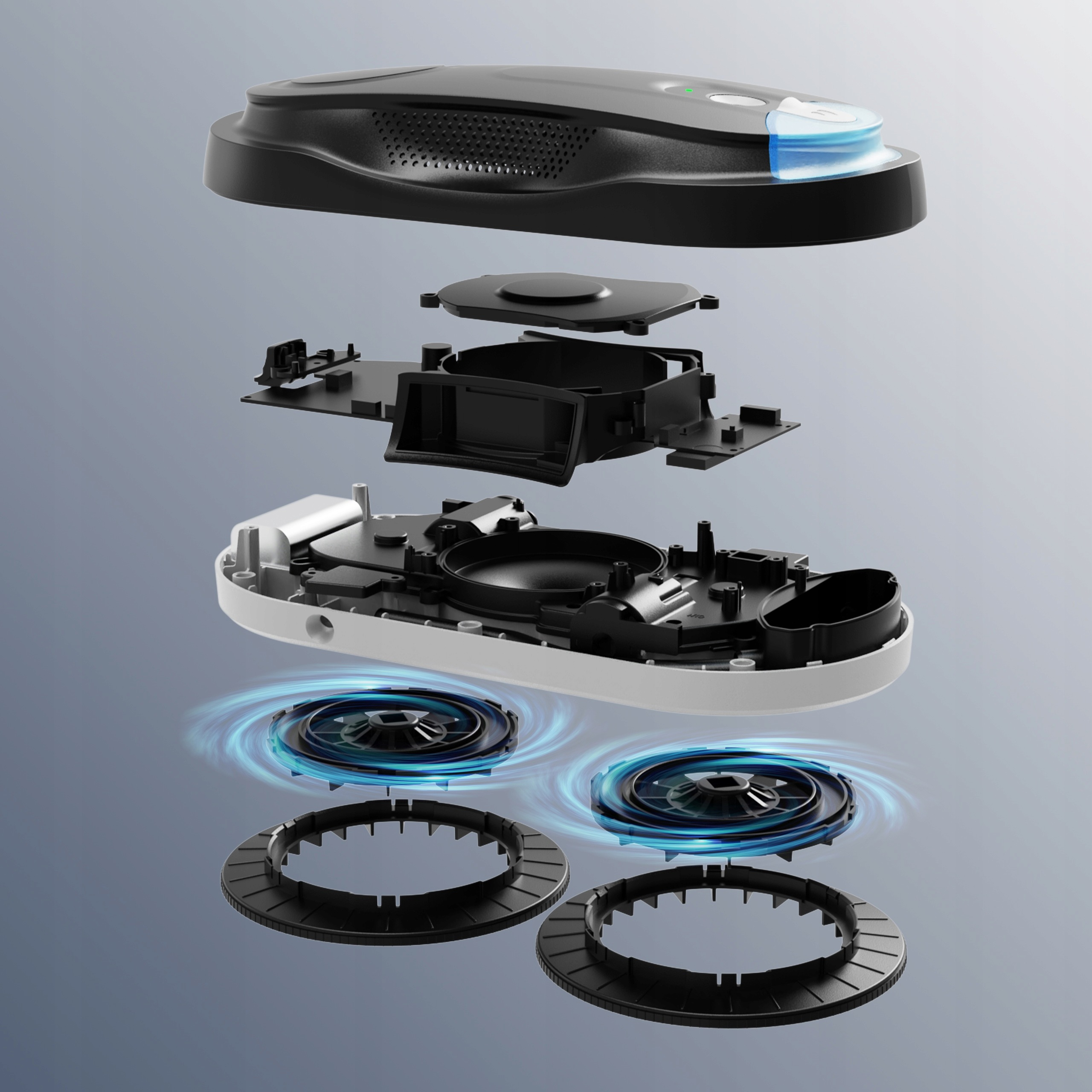 Vista esplosa di un dispositivo tecnologico con scocca, parti interne e due ventole rotanti con effetti di luce blu.