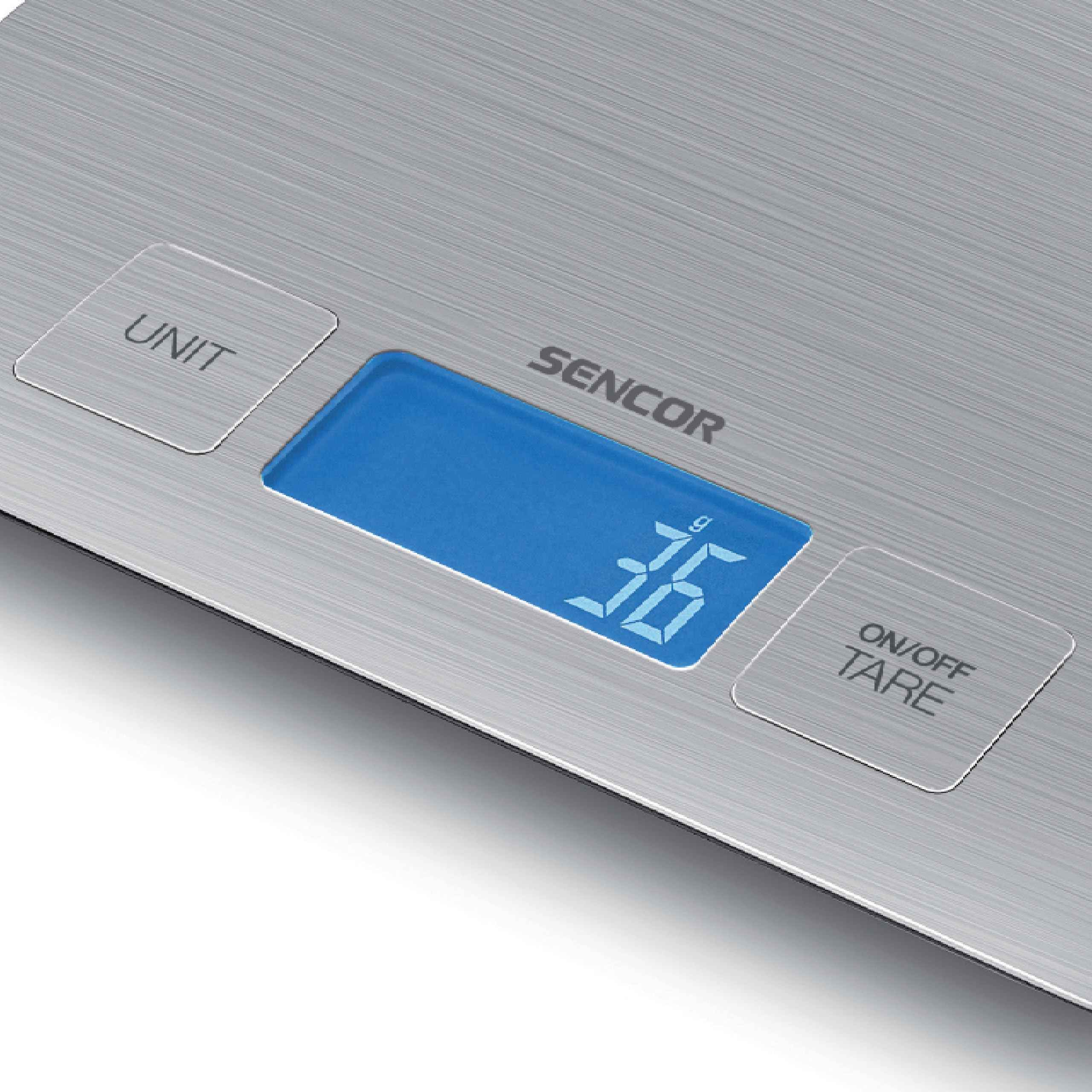 Nahaufnahme einer silbernen Sencor Küchenwaage mit blauem Display, das 36g anzeigt, mit Unit- und On/Off-Tasten.
