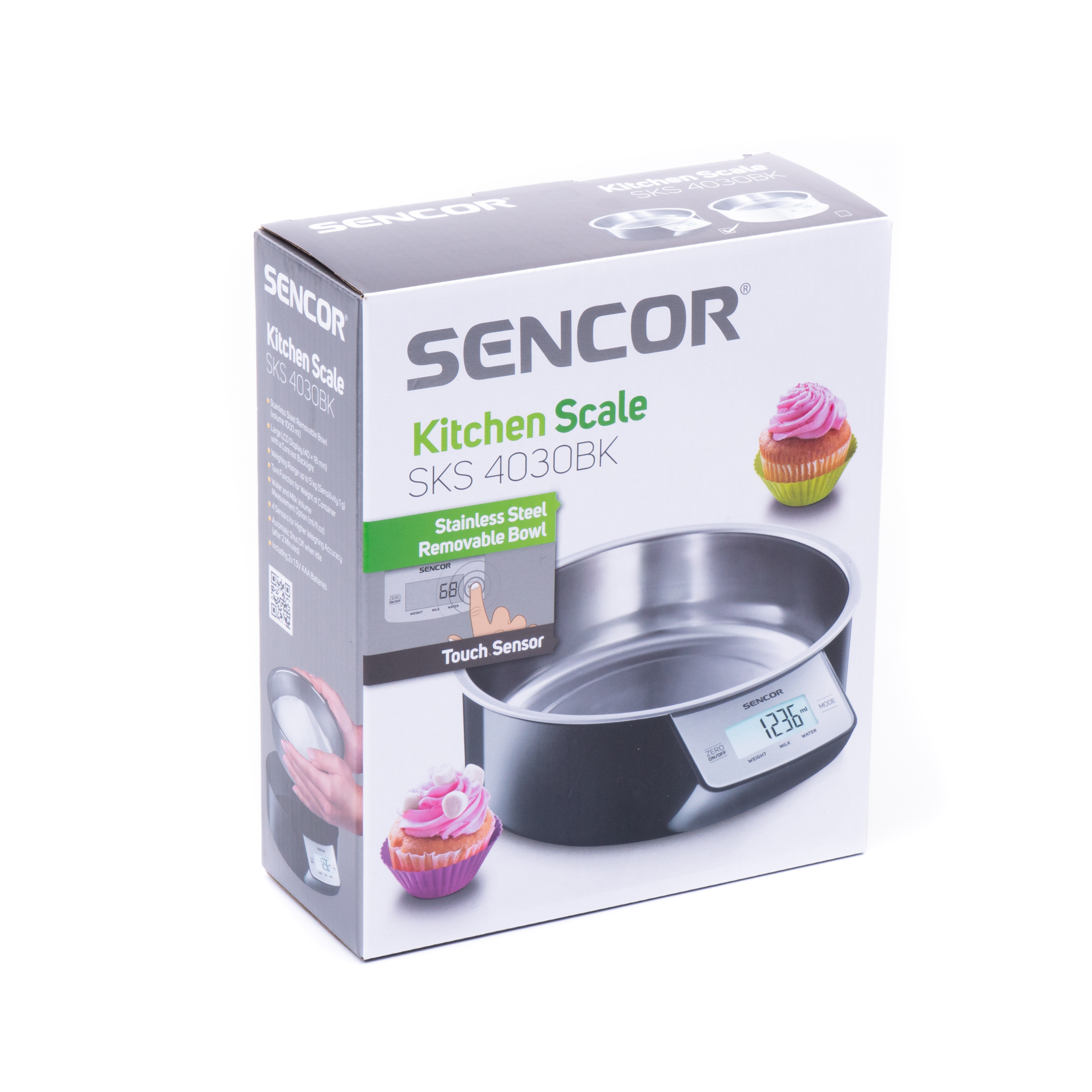 Caja de embalaje de la báscula de cocina Sencor SKS 4030BK con cuenco de acero inoxidable e imágenes de magdalenas.