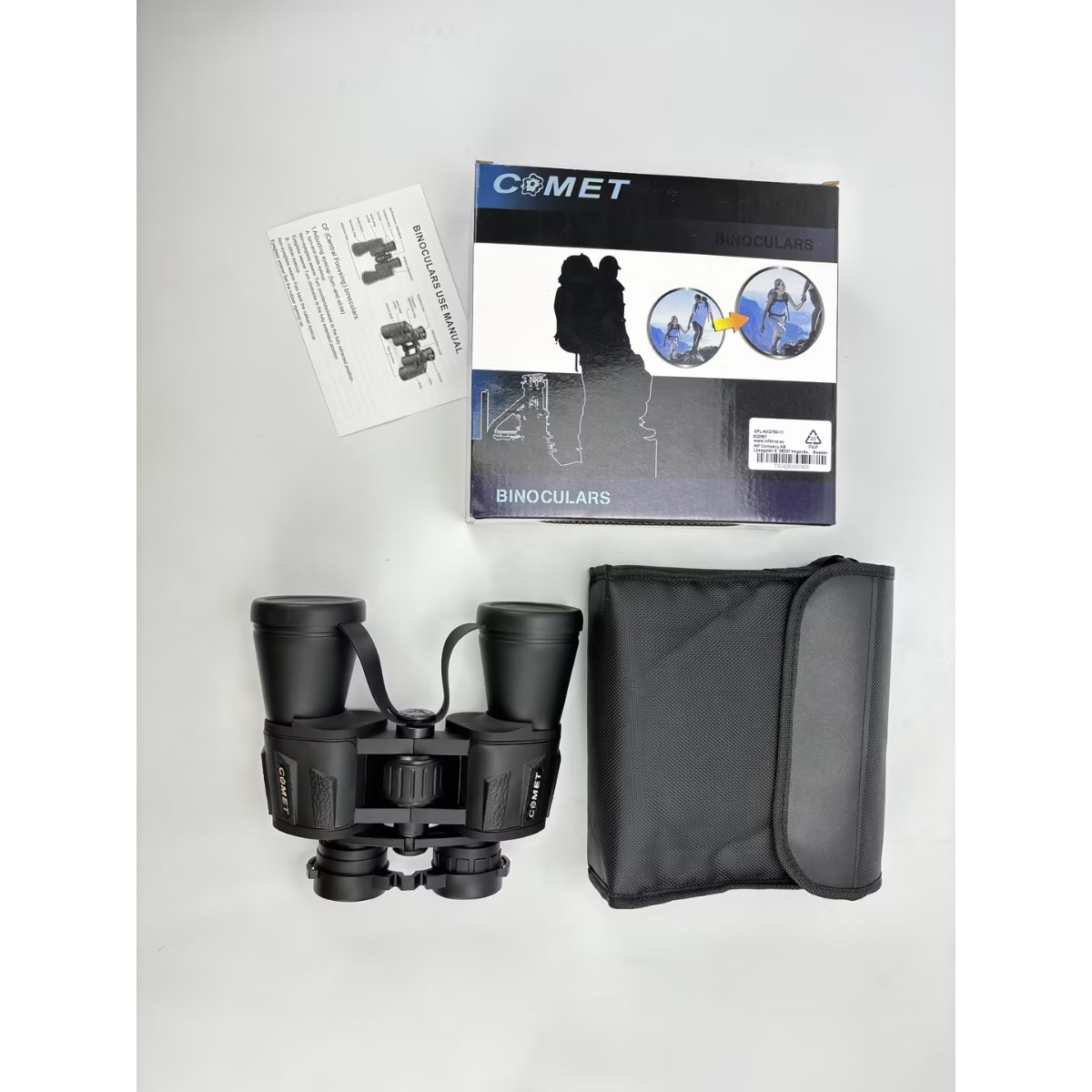 Schwarzes Comet Fernglas mit Koffer, Anleitung und Originalverpackung auf weißem Hintergrund.