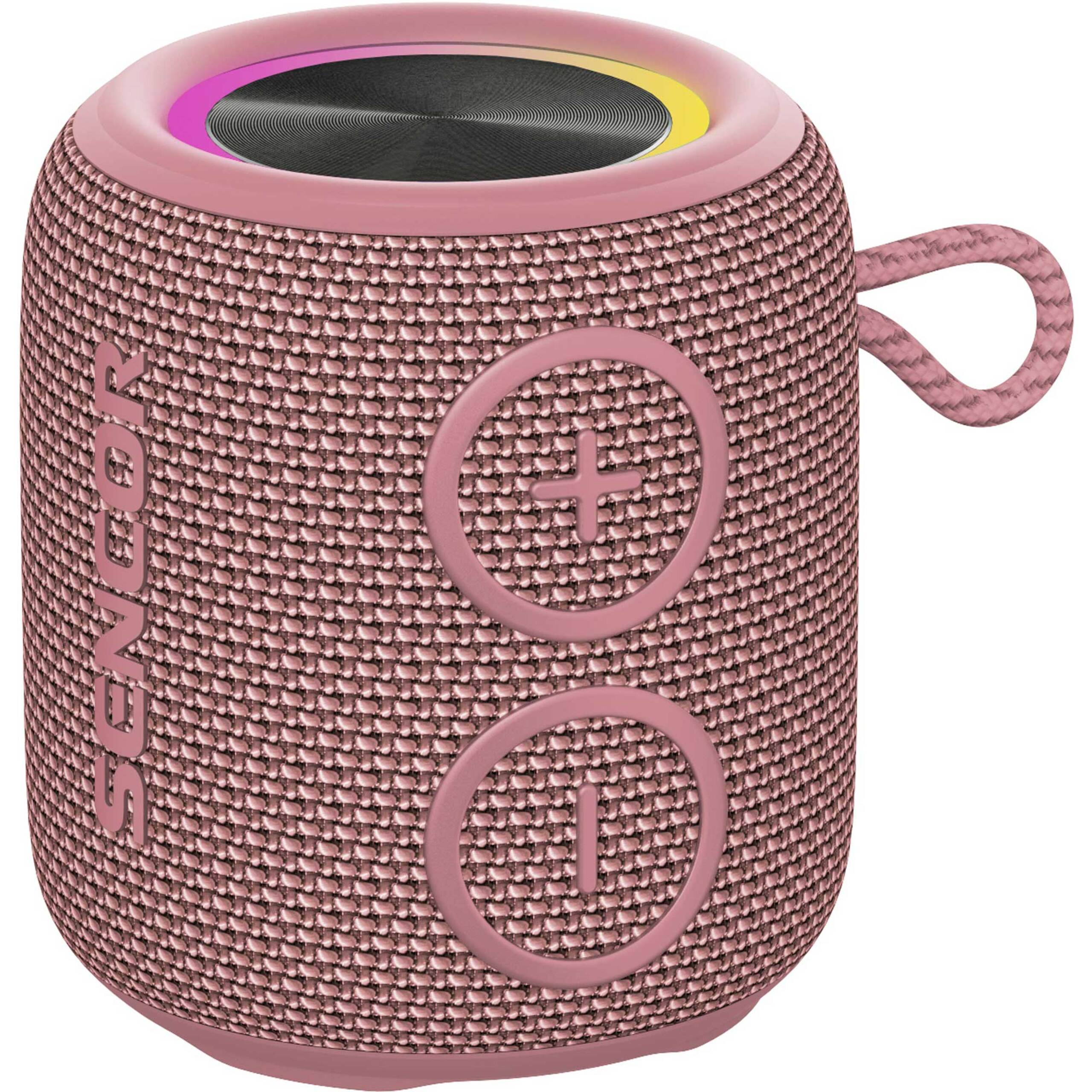 Cylindryczny różowy głośnik Bluetooth w tkaninie, z przyciskami plus i minus oraz pętelką do zawieszania.