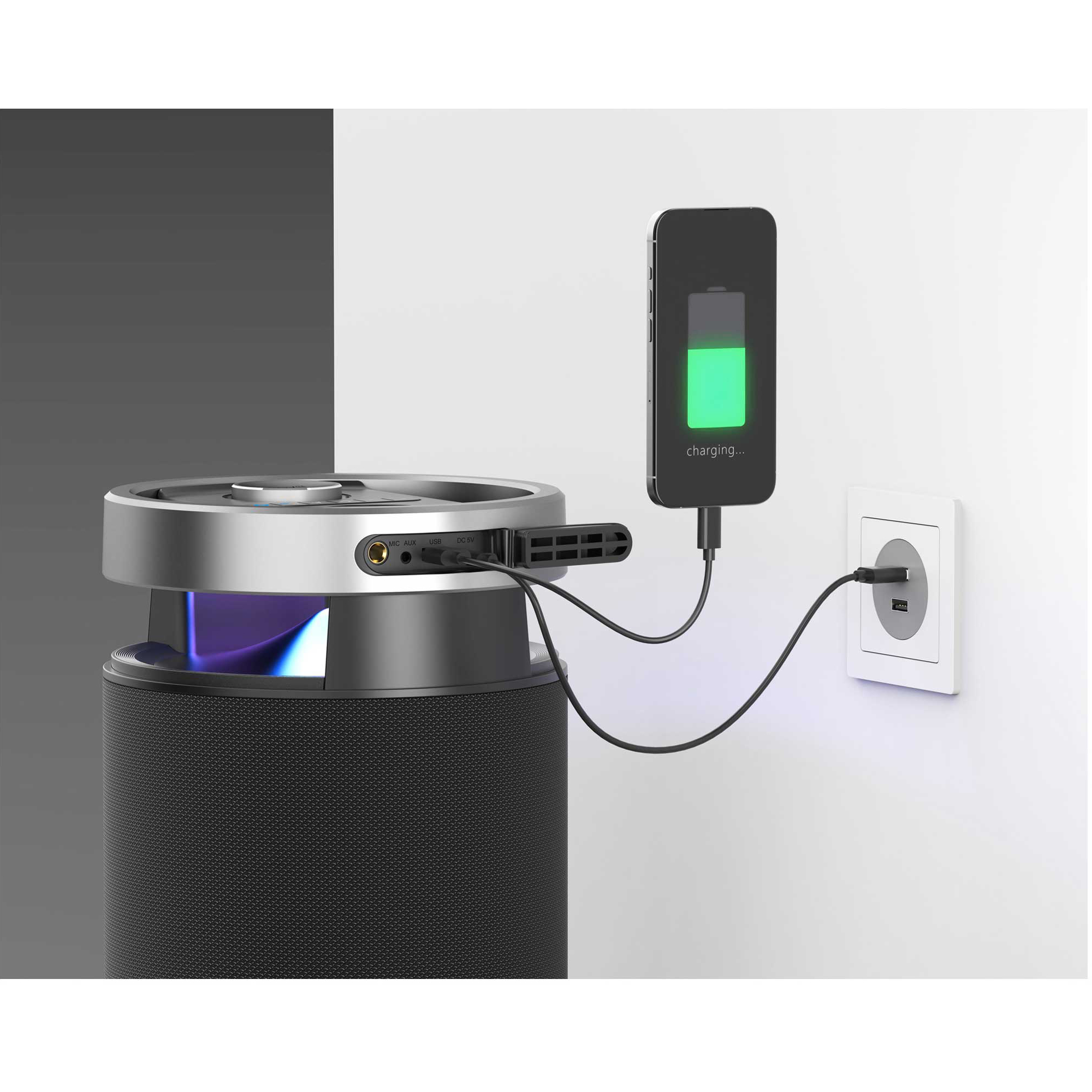 Smartfon ładuje się za pomocą kabla z głośnika z portem USB podłączonego do gniazdka.