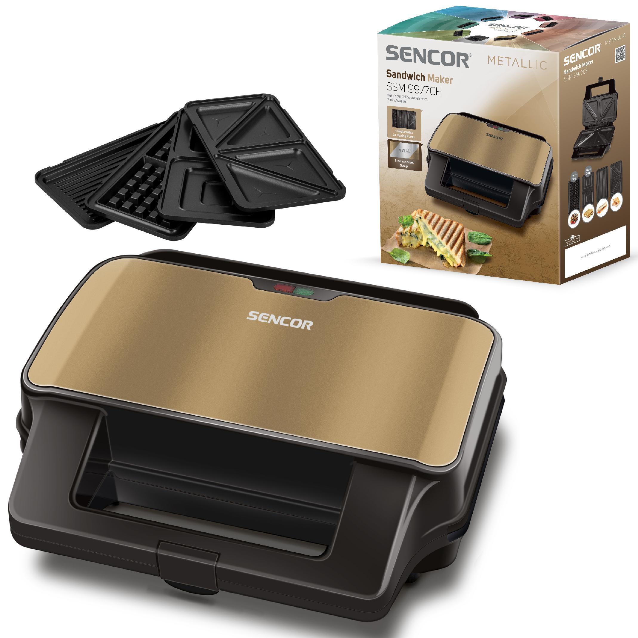 Sencor Sandwichmaker mit metallic-goldener Oberseite, drei austauschbaren Platten und der Verpackung.