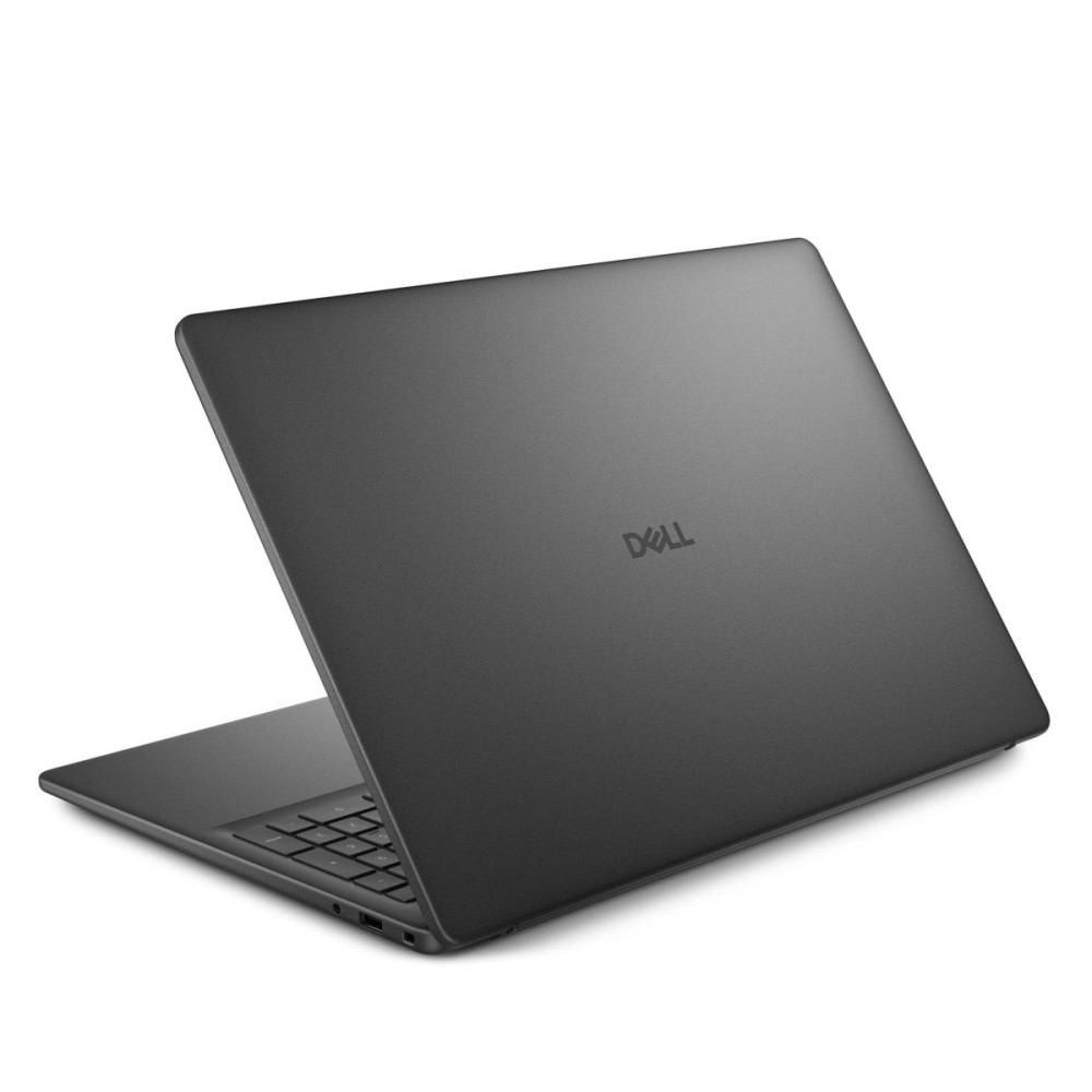 Szary laptop Dell jest otwarty na białej powierzchni, pokazując część klawiatury.