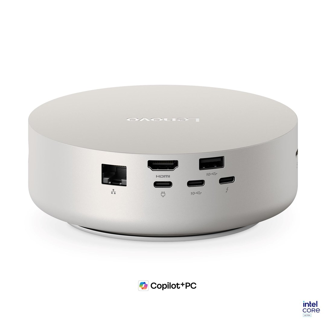 Srebrny, okrągły mini PC Lenovo z różnymi portami z przodu oraz logiem Copilot+ PC.