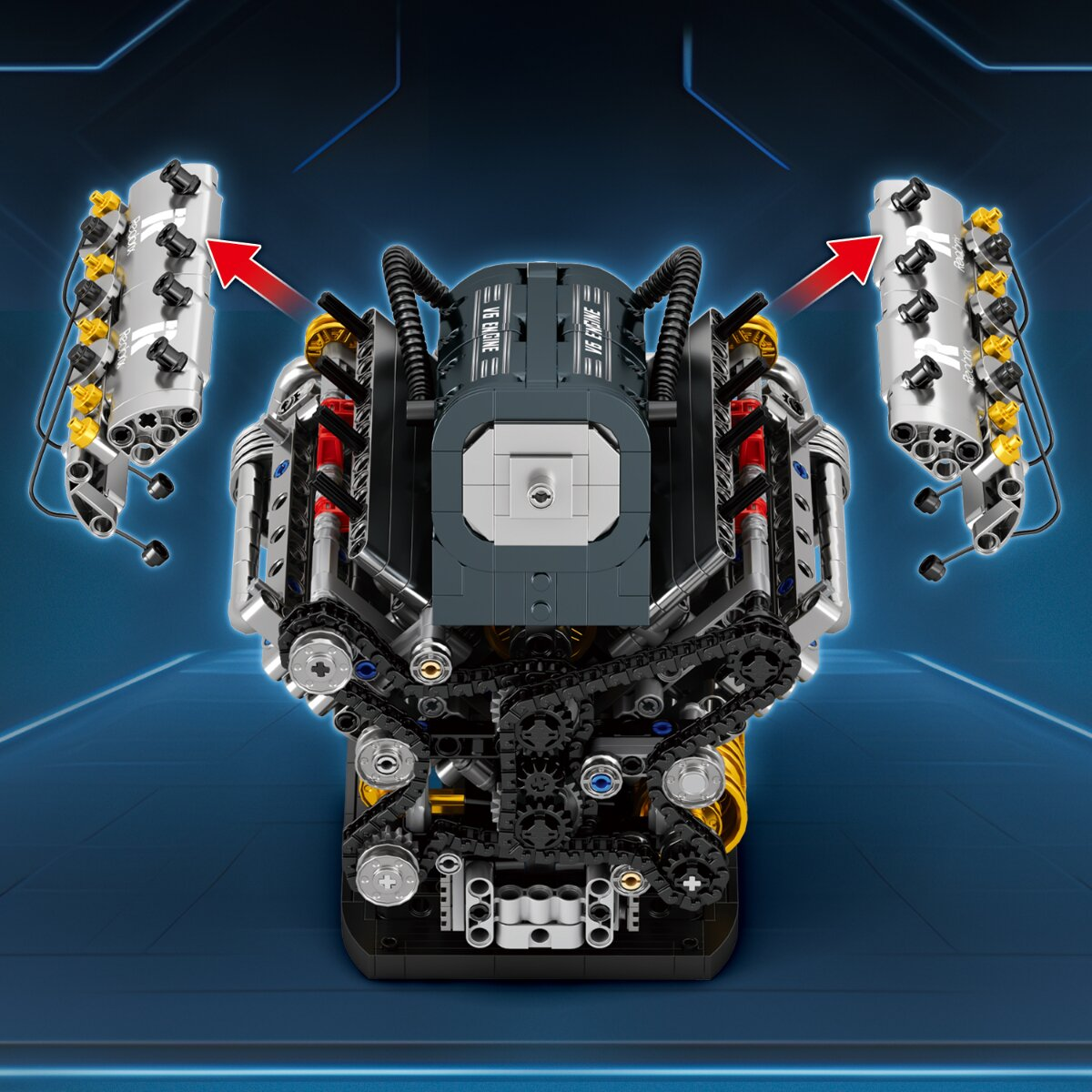 Lego V6-Motor auf blauem Hintergrund mit abnehmbaren Zylinderköpfen.