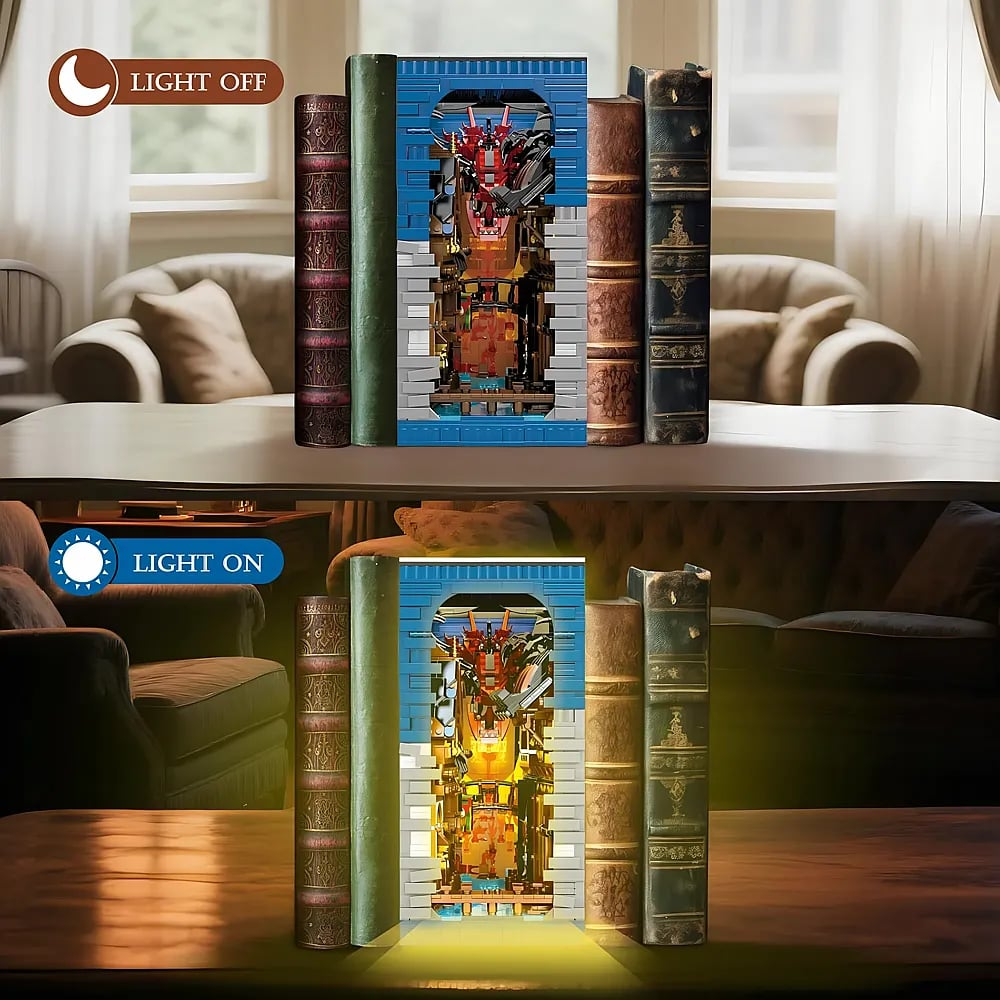 Ein Bücher-Nook mit LED-Beleuchtung im Dunkeln, der ein filigranes Diorama mit Drachen zeigt.