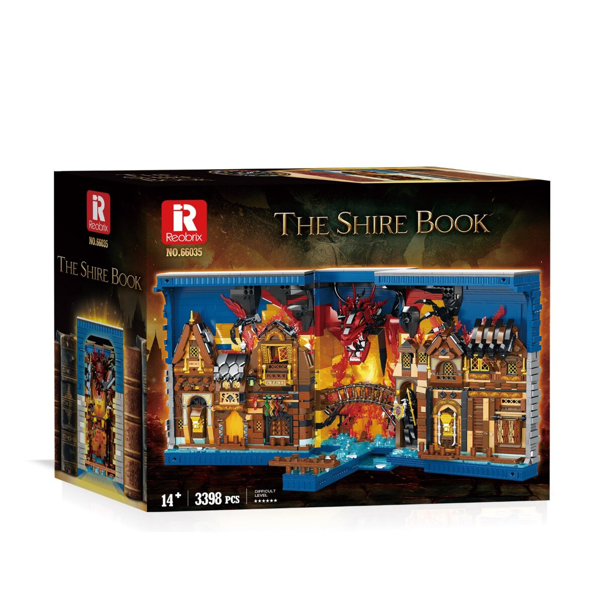 Eine Spielzeug-Baukastenschachtel mit dem Titel The Shire Book, die ein Fantasiedorf mit einem roten Drachen zeigt.