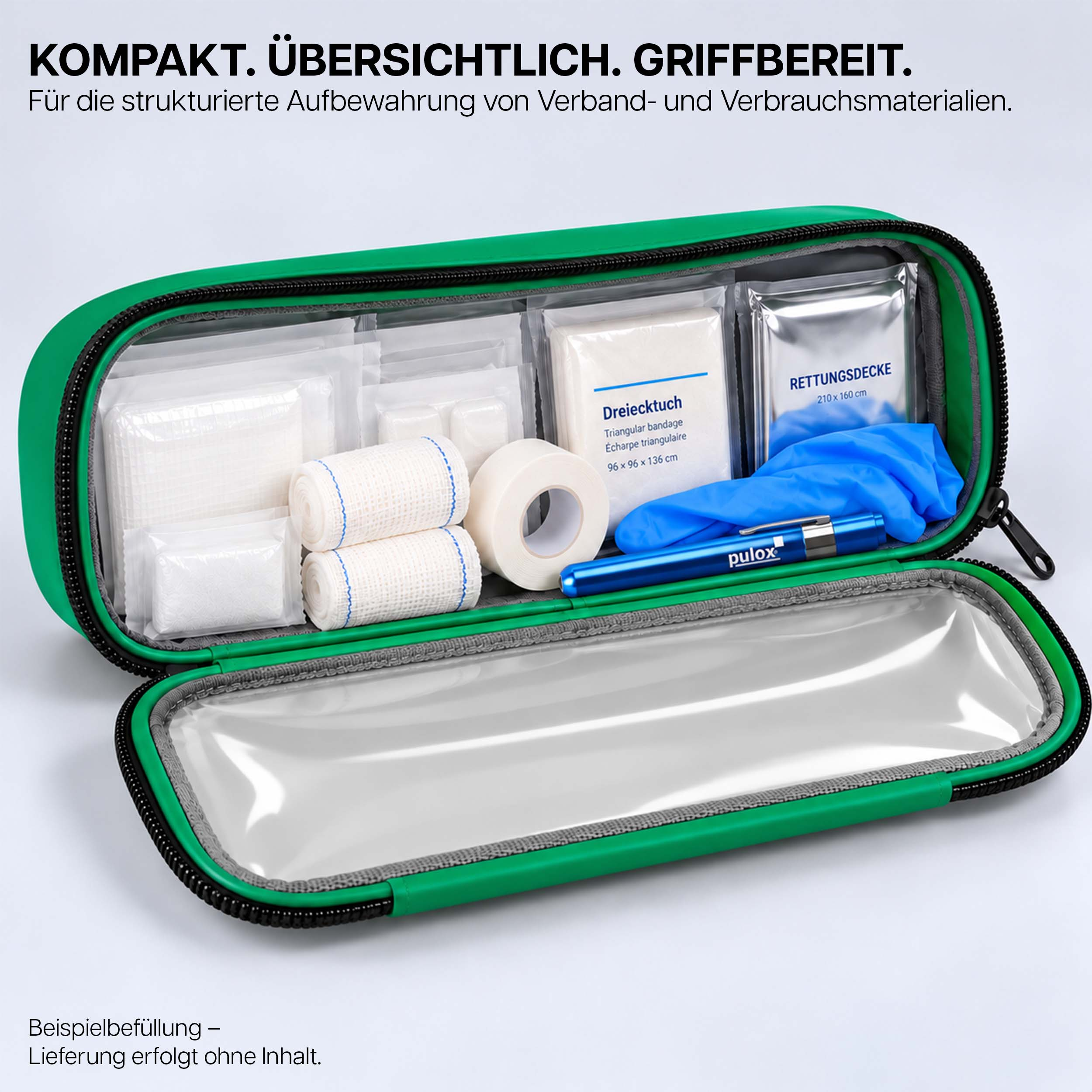 Eine offene grüne Erste-Hilfe-Tasche gefüllt mit medizinischem Bedarf wie Binden, Gaze, Handschuhen und einer Rettungsdecke.