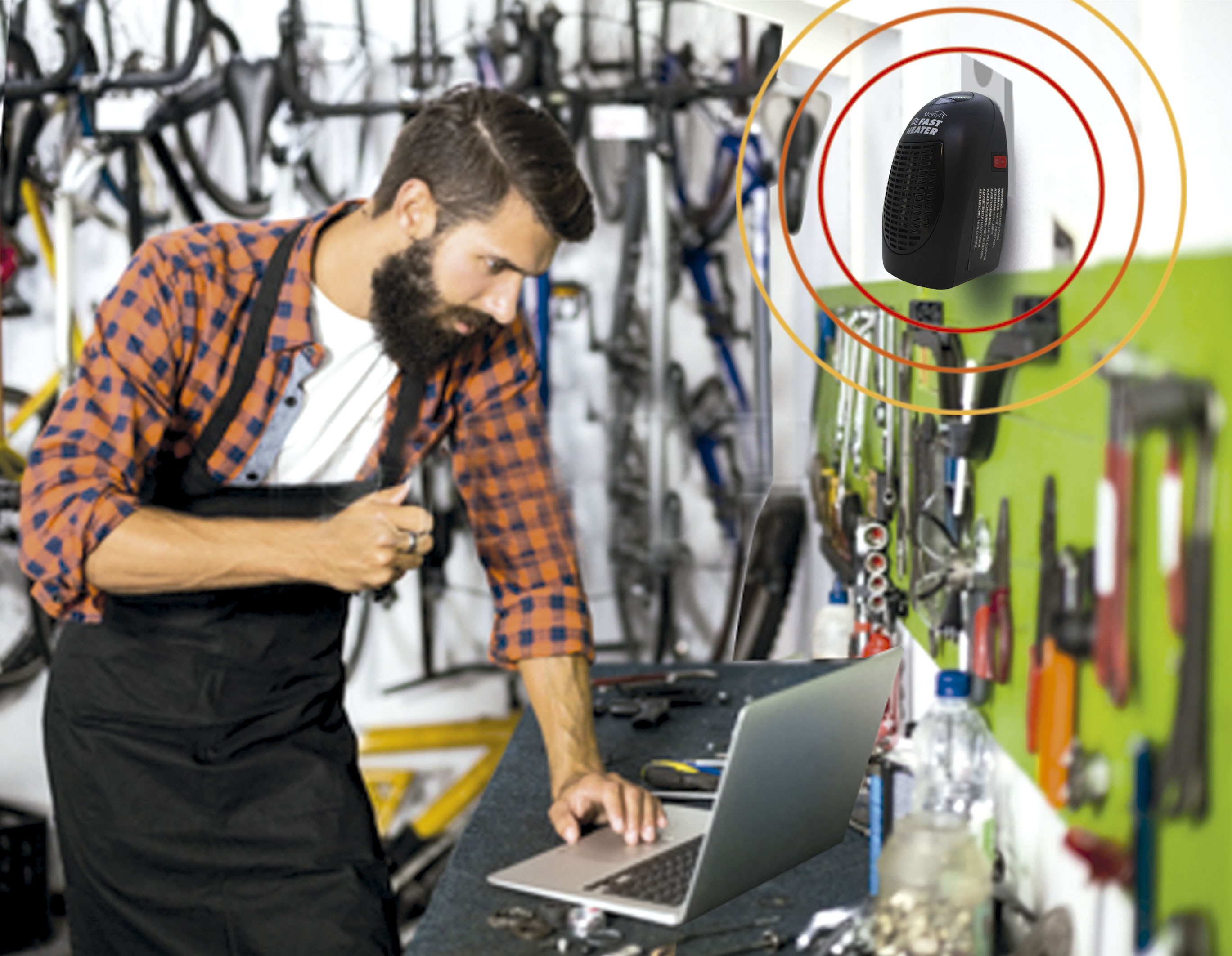 Mechaniker in Werkstatt mit Laptop und Heizgerät.