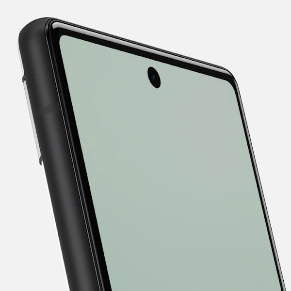 Nahaufnahme der oberen Ecke eines Smartphones mit schwarzem Gehäuse, grünem Display und einer Frontkamera.