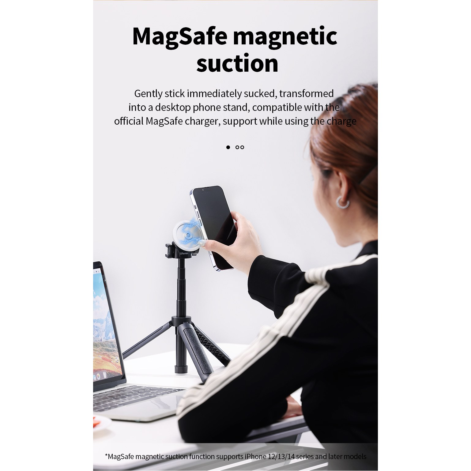 Een vrouw bevestigt magnetisch een smartphone op een klein bureaustatief.