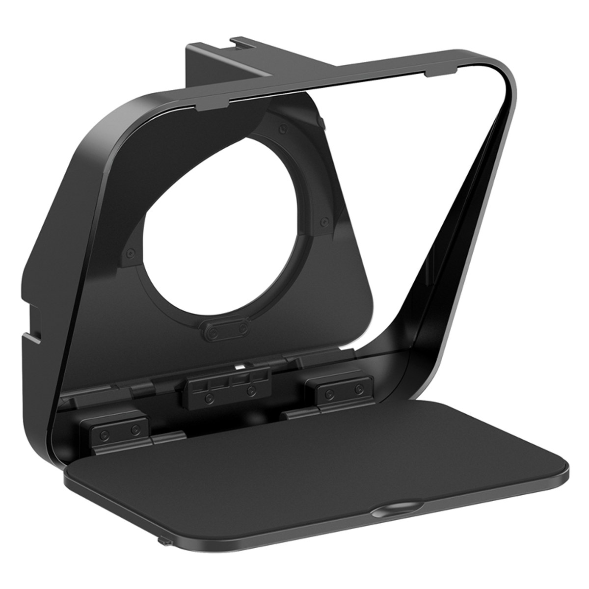 Appareil en plastique noir avec grande ouverture ronde et plaque de base pliante sur fond blanc.