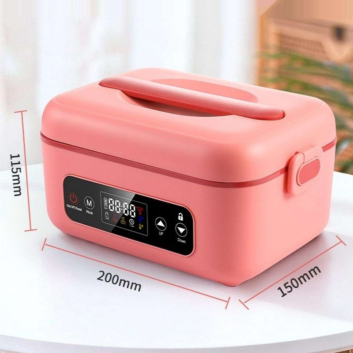 Rosa elektrische Lunchbox auf weißem Tisch mit Maßangaben.
