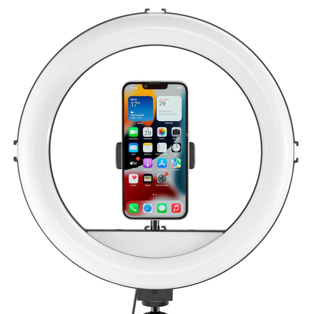 Ein Smartphone ist in der Mitte eines großen, leuchtenden Ringlichts auf einem Ständer montiert.
