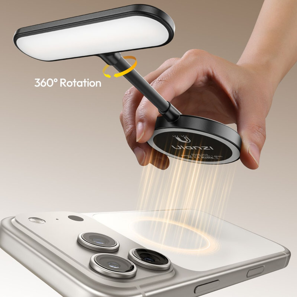 Hand holds a rotatable Ulanzi LED light above a smartphone.