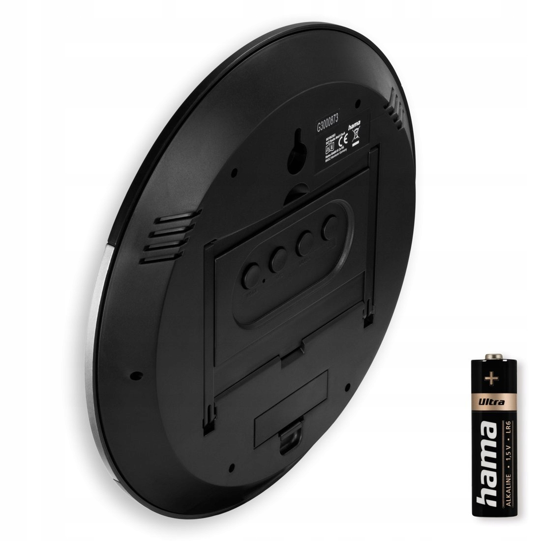Die Rückseite einer schwarzen Wanduhr mit Einstellknöpfen und einer separaten AA-Batterie.