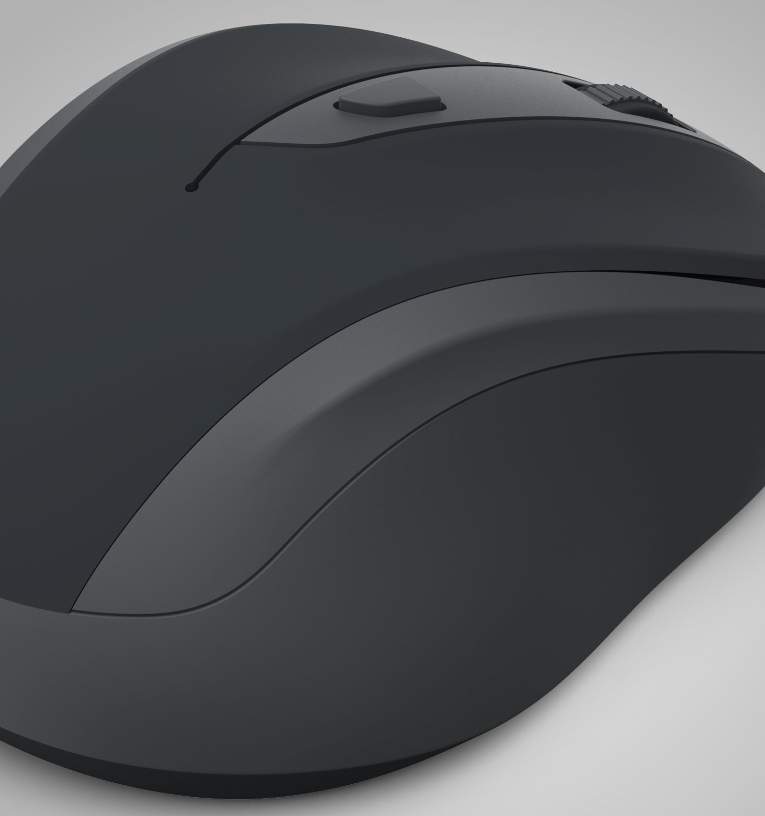 Primo piano di un moderno mouse per computer nero opaco su sfondo grigio chiaro.