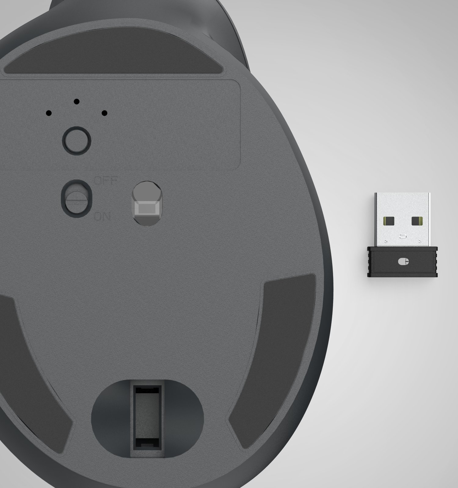 Parte inferior de un ratón inalámbrico gris con interruptor de encendido y receptor USB.