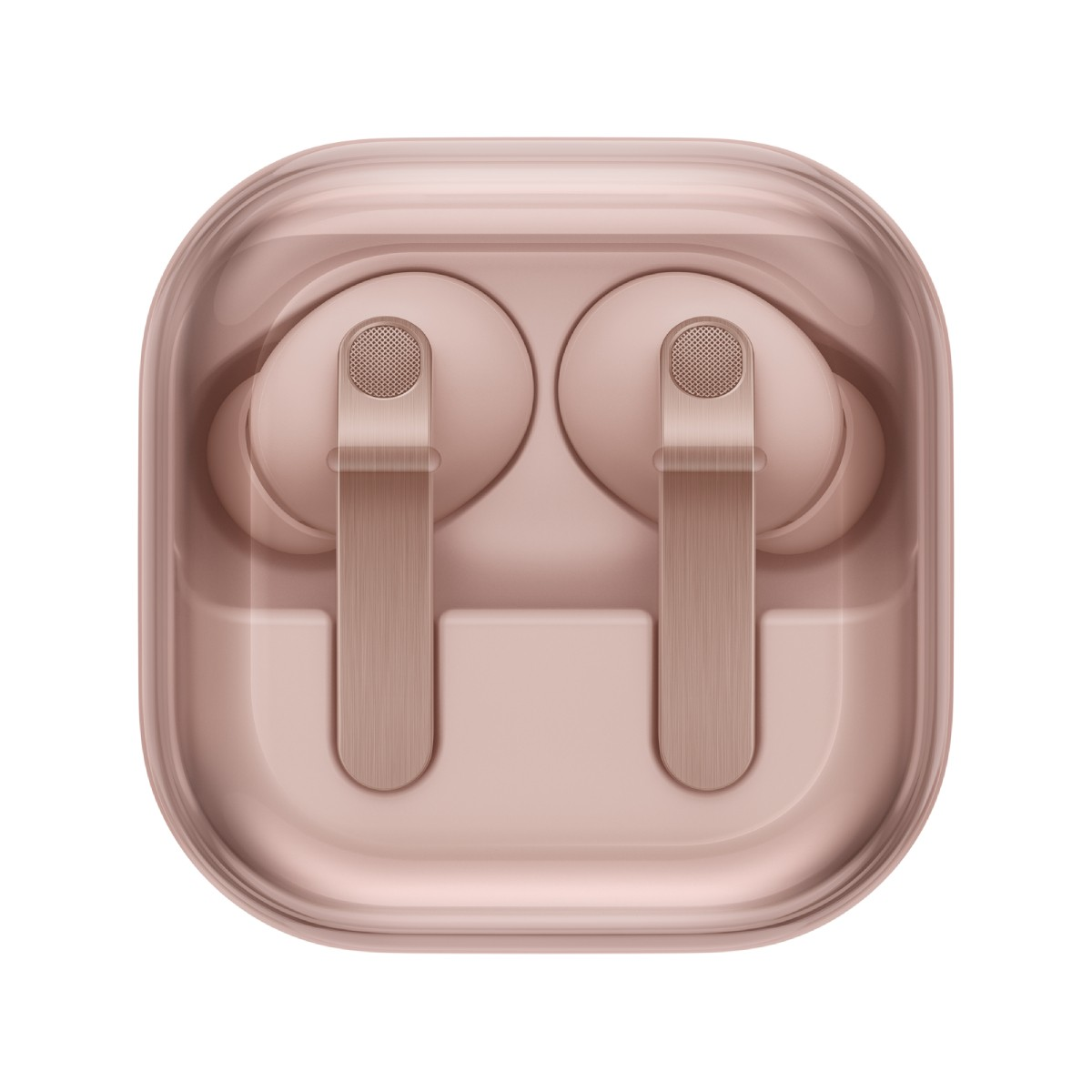 Auricolari wireless rosa nella custodia su sfondo bianco.