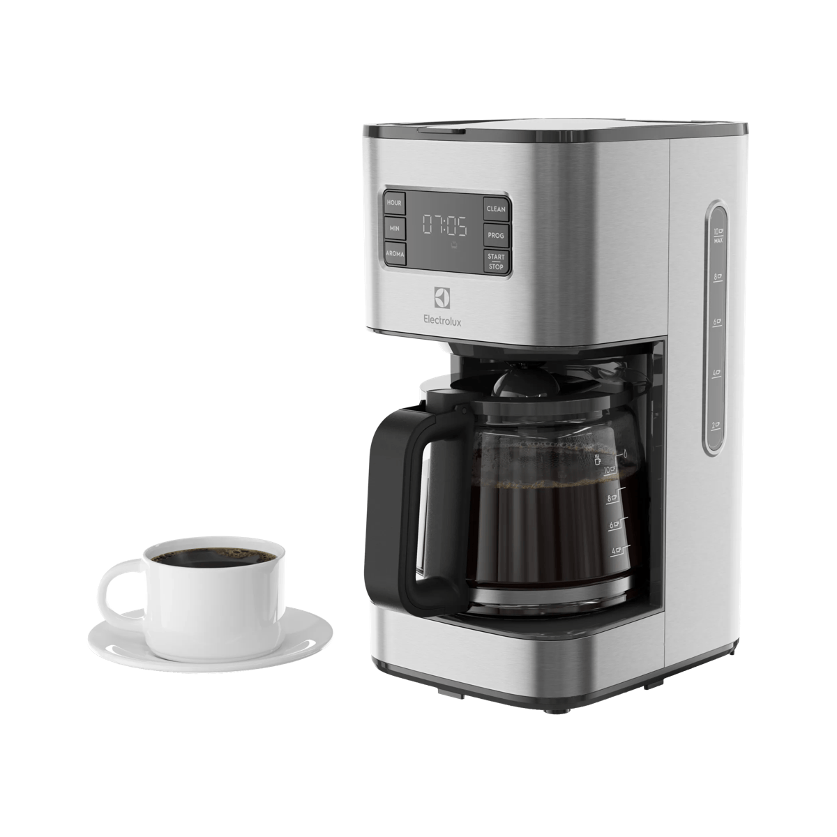 Una macchina da caffè argentata con caraffa di vetro e tazza bianca su piattino.