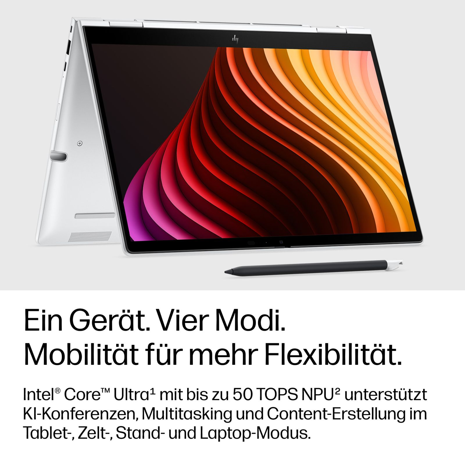 Ein weißer Laptop mit bunter Welle auf dem Bildschirm und einem Stift davor.
