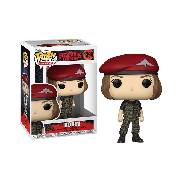 Funko Pop Figur von Robin aus Stranger Things in Tarnkleidung mit rotem Beret neben ihrer Verpackung.