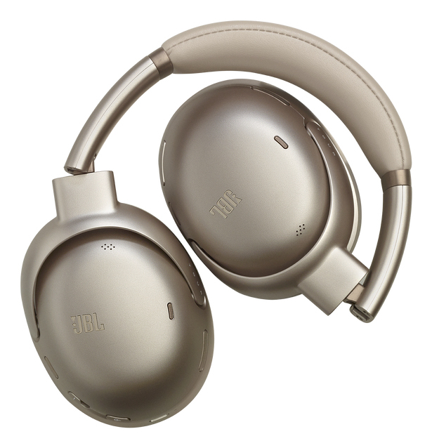 Cuffie wireless over-ear JBL beige su sfondo bianco, parzialmente piegate con marchio visibile.