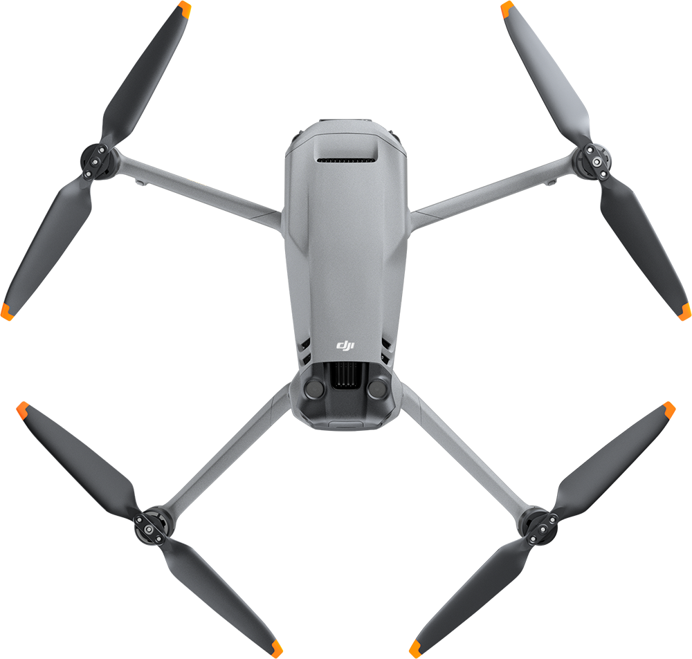 Ansicht von oben auf eine graue DJI-Drohne mit vier ausgeklappten Propellerarmen auf schwarzem Hintergrund.