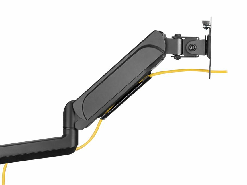 A black monitor arm with a gas spring and a yellow cable routed neatly along it.
