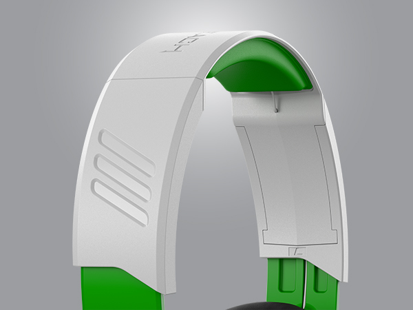 Primer plano de una diadema de auriculares blanca con interior verde sobre fondo gris.