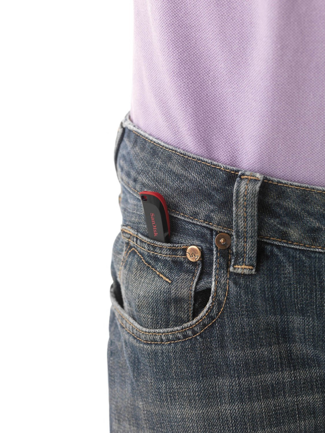 A red SanDisk USB flash drive in the small front pocket of blue jeans, worn with a purple shirt.