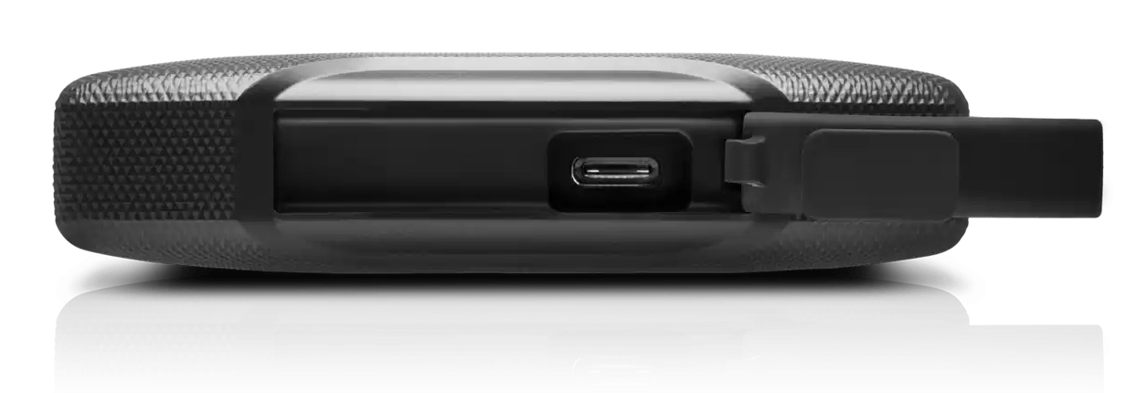 Black external hard drive with open USB-C port and rubber cap against a white background.