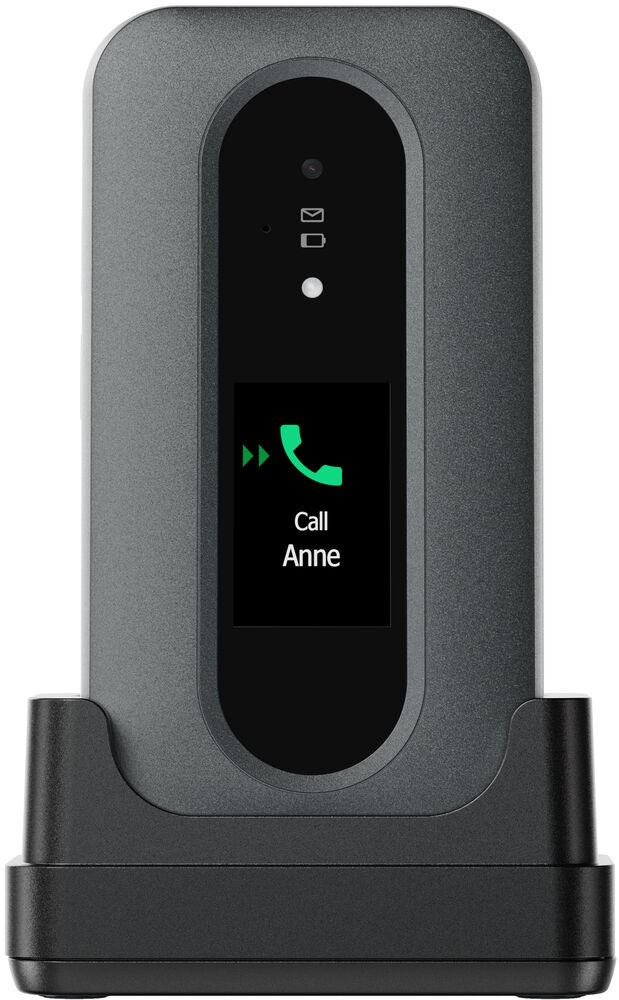 Un cellulare grigio in una base di ricarica nera mostra una schermata di chiamata con una cornetta verde e la scritta Call Anne.