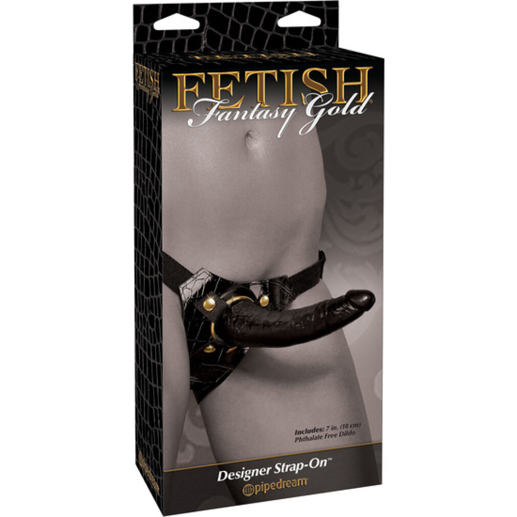 Verpackung von Fetish Fantasy Gold Designer Strap-On mit einem schwarzen Gurt und Dildo.