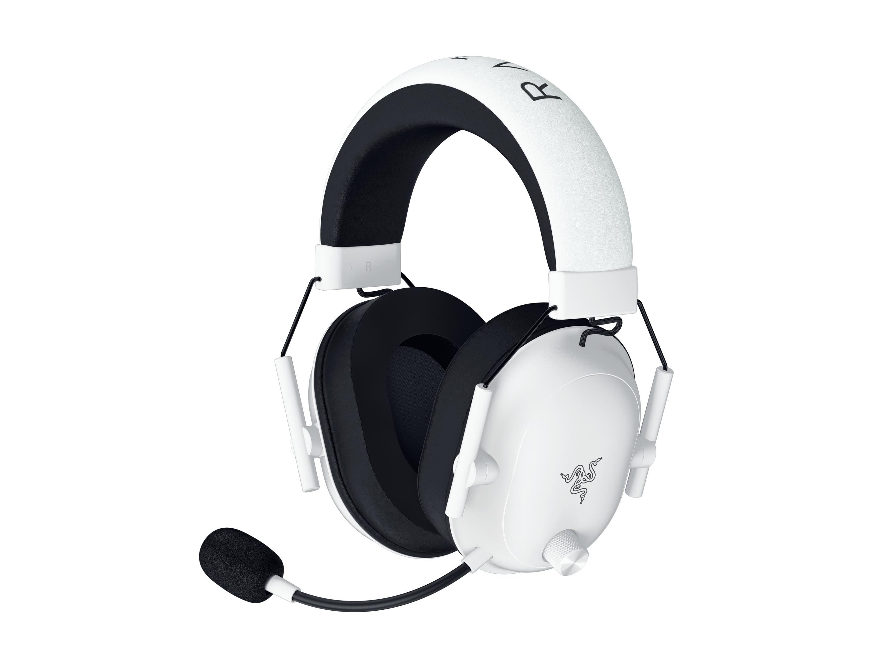 Cuffie da gioco bianche e nere con microfono rimovibile e regolatore di volume.